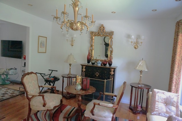 6251 Decker Rd, Bushkill, PA 18324 - sitting room with wood finished floors and a chandelier