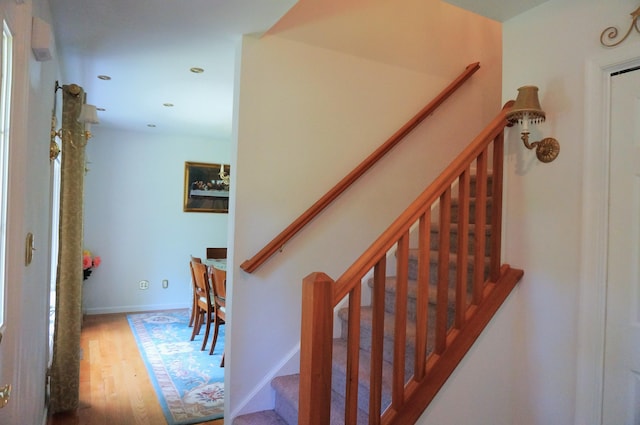 6251 Decker Rd, Bushkill, PA 18324 - staircase with wood finished floors and recessed lighting