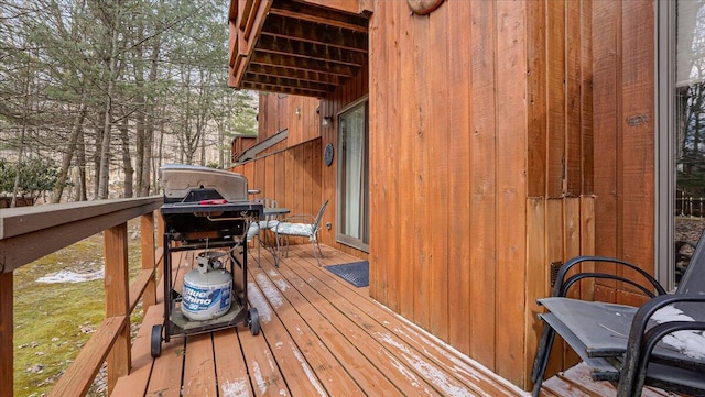 wooden deck featuring grilling area