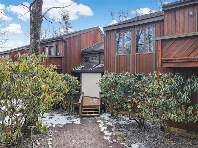 rear view of property with a deck