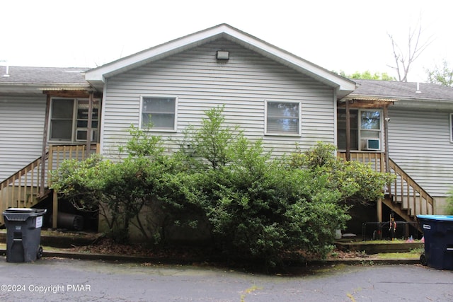 view of front of house with stairway