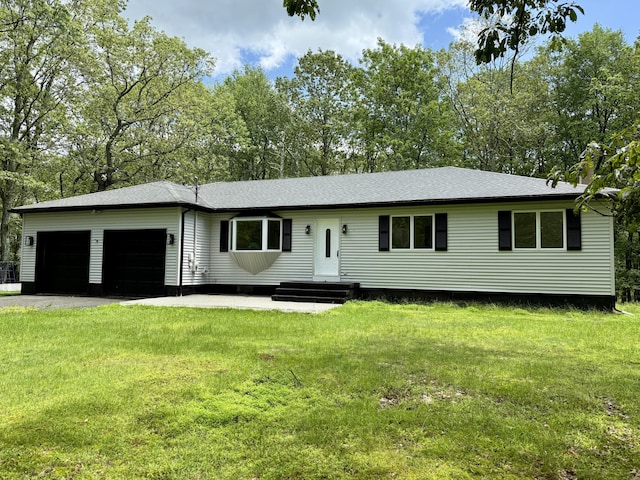 248 Seneca Dr, Milford, PA 18337 - view of front of house with an attached garage, a front lawn, driveway, and roof with shingles