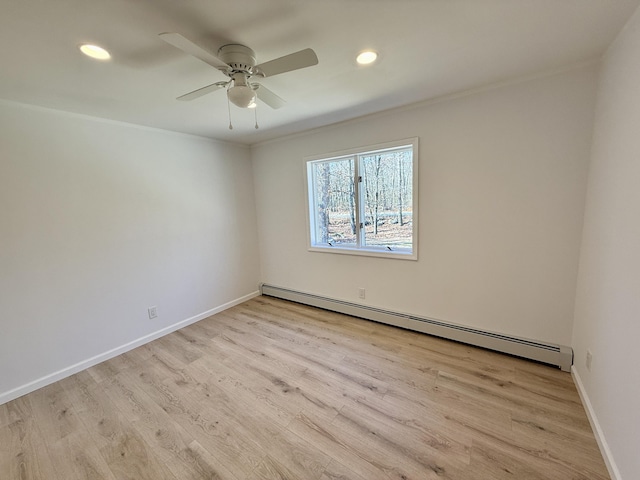 248 Seneca Dr, Milford, PA 18337 - unfurnished room with a baseboard heating unit, recessed lighting, wood finished floors, ceiling fan, and ornamental molding