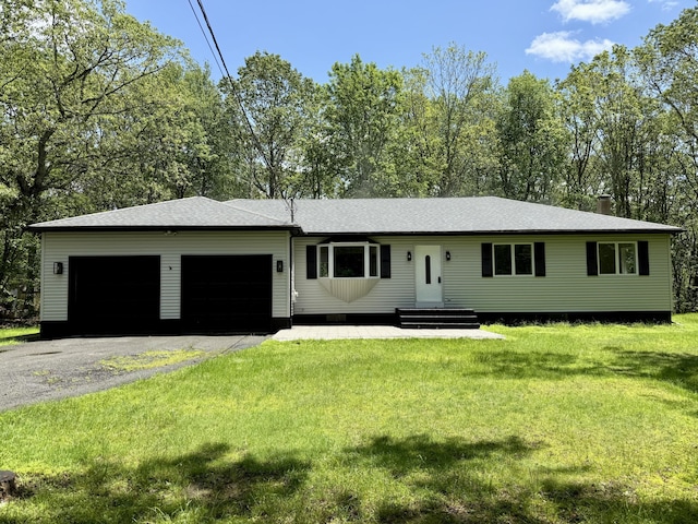 248 Seneca Dr, Milford, PA 18337 - view of front of property featuring a garage, driveway, a front yard, roof with shingles, and a chimney