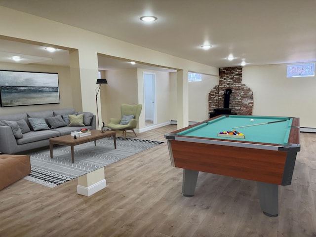 248 Seneca Dr, Milford, PA 18337 - game room featuring wood finished floors, billiards, recessed lighting, and a wood stove