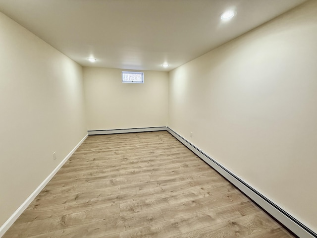 248 Seneca Dr, Milford, PA 18337 - basement with a baseboard radiator, recessed lighting, and light wood-style flooring