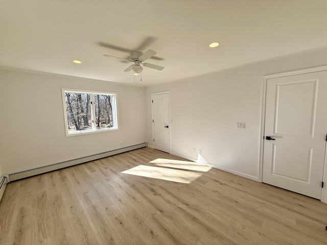 248 Seneca Dr, Milford, PA 18337 - spare room with a baseboard radiator, light wood finished floors, ceiling fan, and recessed lighting