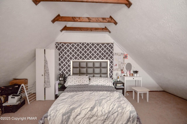 bedroom with vaulted ceiling with beams, carpet floors, and a textured ceiling