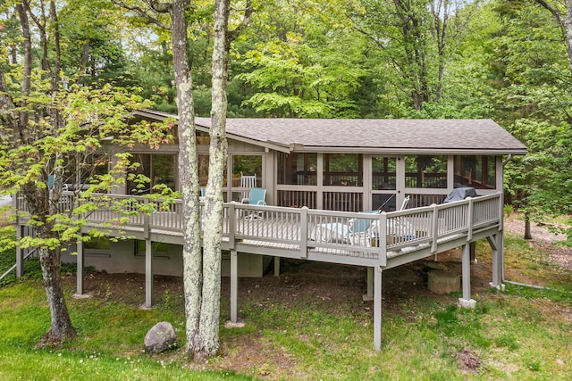 104 Jimmy Pond Ct, Pocono Pines, PA 18350 - view of front of property featuring roof with shingles, a deck, and a forest view
