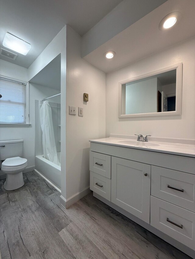 104 Sunset Dr, Mount Pocono, PA 18344 - bathroom featuring toilet, baseboards, visible vents, wood finished floors, and vanity