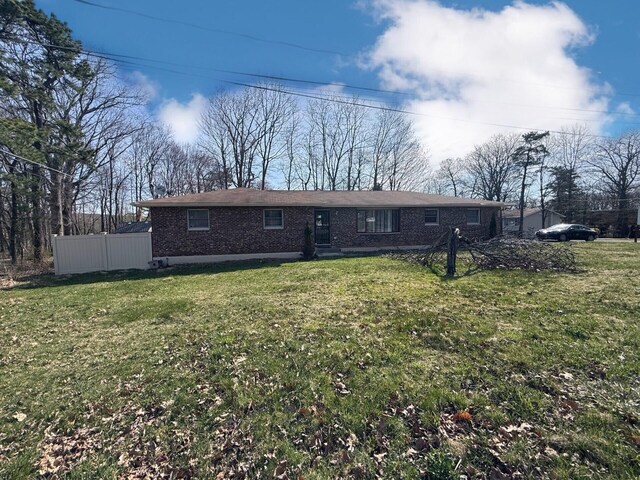104 Sunset Dr, Mount Pocono, PA 18344 - exterior space with fence, brick siding, and a yard