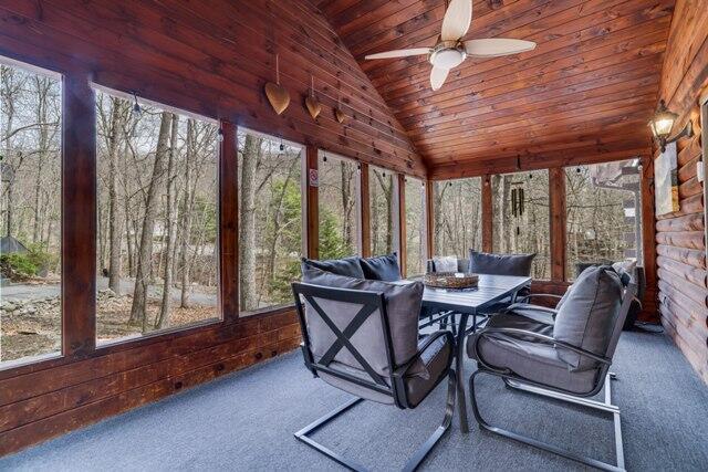 232 Stafford Dr, Bushkill, PA 18324 - sunroom / solarium with lofted ceiling, carpet flooring, wooden ceiling, a ceiling fan, and outdoor dining area
