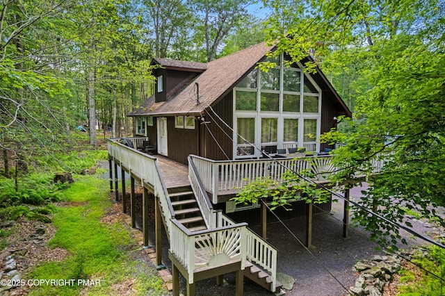 1046 Maple Dr, Pocono Lake, PA 18347 - rear view of house with stairs, a wooden deck, and a shingled roof