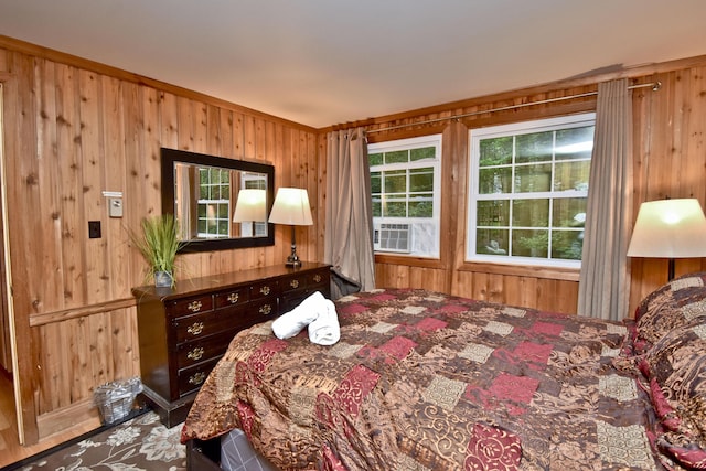 1046 Maple Dr, Pocono Lake, PA 18347 - bedroom featuring wood walls, cooling unit, and ornamental molding