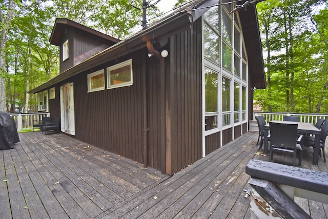 1046 Maple Dr, Pocono Lake, PA 18347 - wooden terrace with outdoor dining area