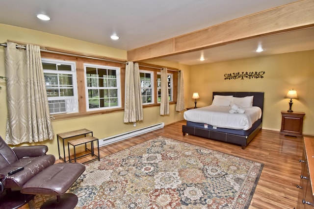 1046 Maple Dr, Pocono Lake, PA 18347 - bedroom with a baseboard radiator, wood finished floors, cooling unit, and recessed lighting