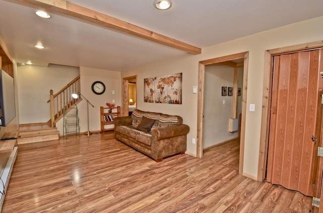 1046 Maple Dr, Pocono Lake, PA 18347 - living room featuring stairway, light wood finished floors, recessed lighting, and beam ceiling