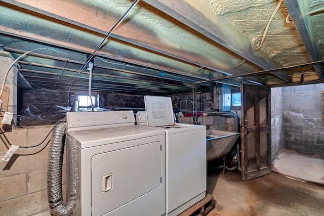 basement featuring washer and dryer and plenty of natural light