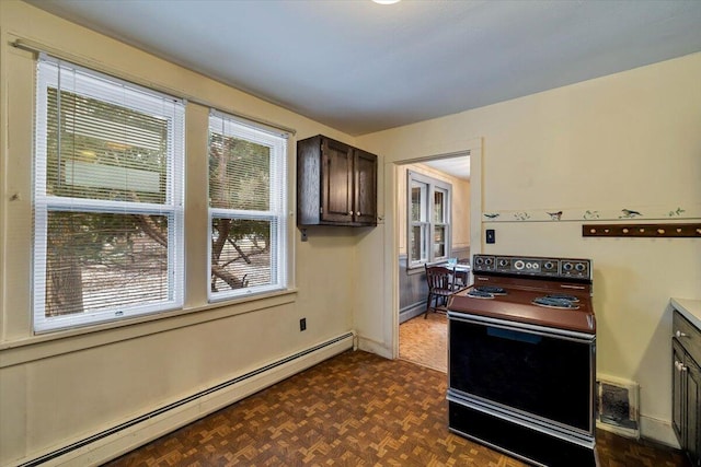 kitchen featuring a baseboard radiator, dark brown cabinets, electric range oven, and visible vents