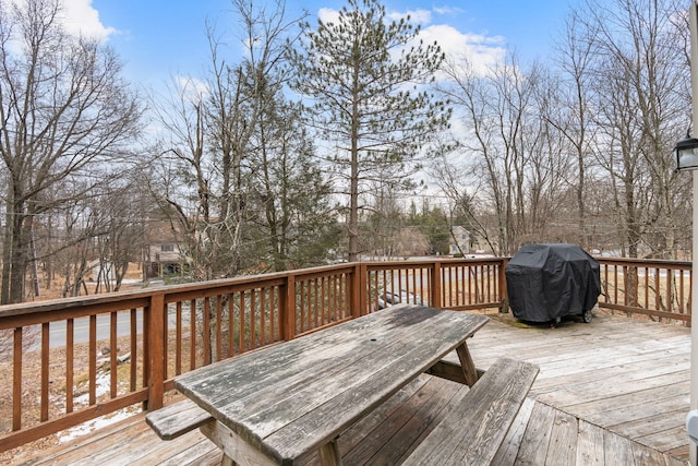 wooden deck with grilling area