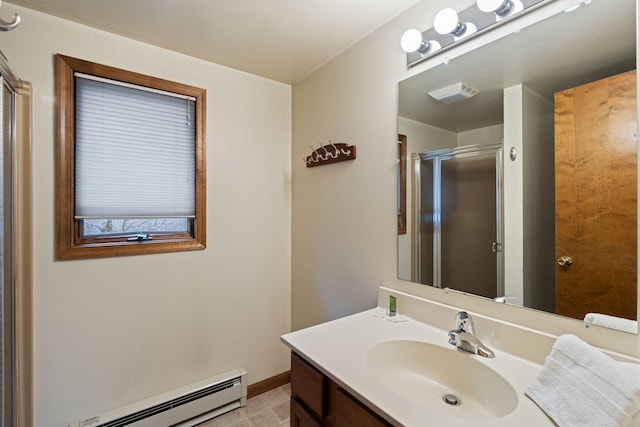 full bathroom featuring baseboards, visible vents, a shower with door, vanity, and a baseboard heating unit