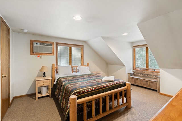 bedroom with vaulted ceiling, a wall mounted AC, recessed lighting, and baseboards