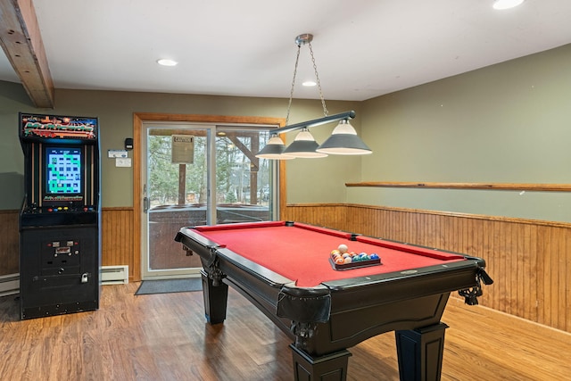 playroom featuring a wainscoted wall, a baseboard radiator, wood finished floors, pool table, and wood walls