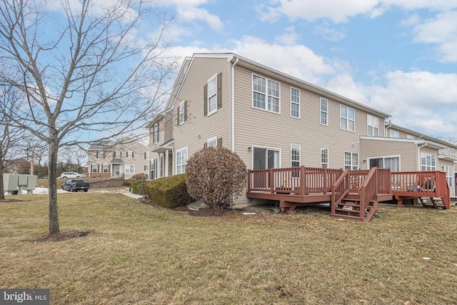 exterior space with a lawn and a wooden deck