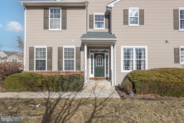 view of front of property with brick siding