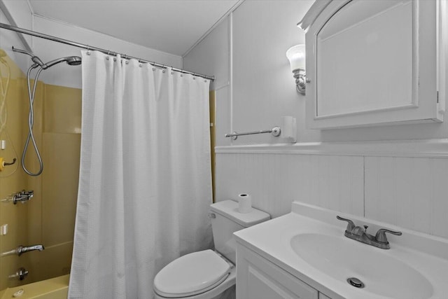 1232 Redwood Ter, Pocono Pines, PA 18350 - bathroom featuring toilet, wainscoting, shower / bath combo, and vanity