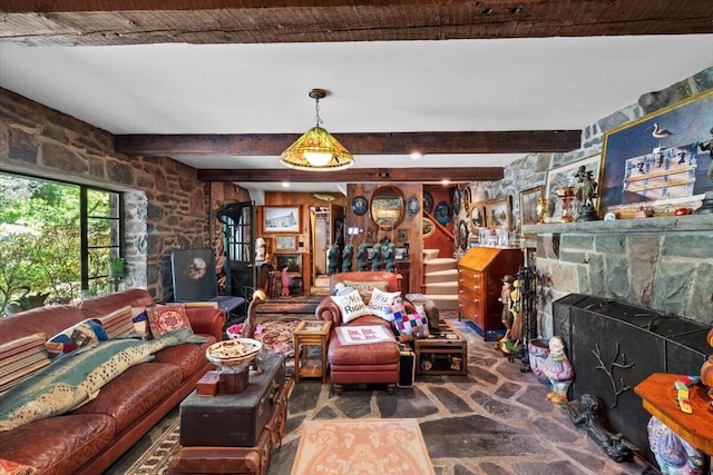 1341 Beaver Valley Rd, Stroudsburg, PA 18360 - living room with beam ceiling, a fireplace, and stone floors