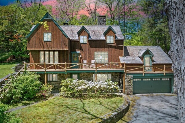 1341 Beaver Valley Rd, Stroudsburg, PA 18360 - view of front facade featuring a chimney, driveway, stone siding, and a front lawn