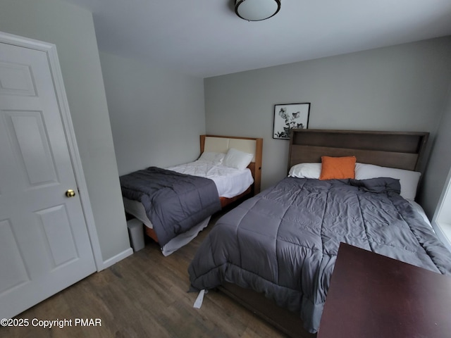 bedroom featuring hardwood / wood-style flooring