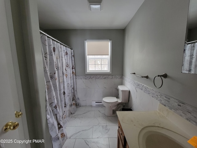 bathroom featuring toilet, tile walls, a baseboard radiator, vanity, and a shower with shower curtain