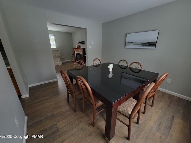 dining area featuring hardwood / wood-style flooring