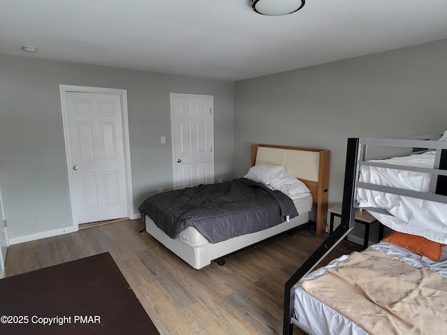 bedroom featuring hardwood / wood-style floors