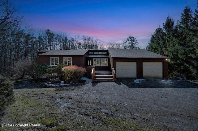 view of front of house featuring a garage and driveway