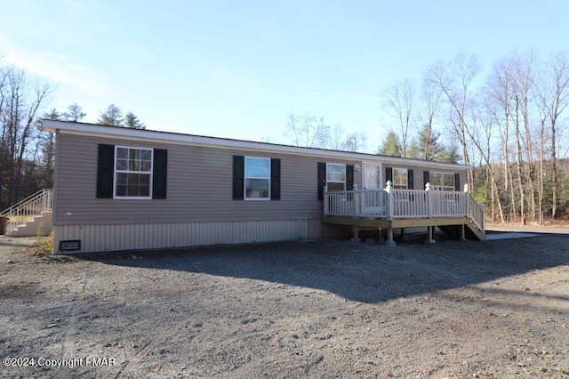 manufactured / mobile home featuring a deck