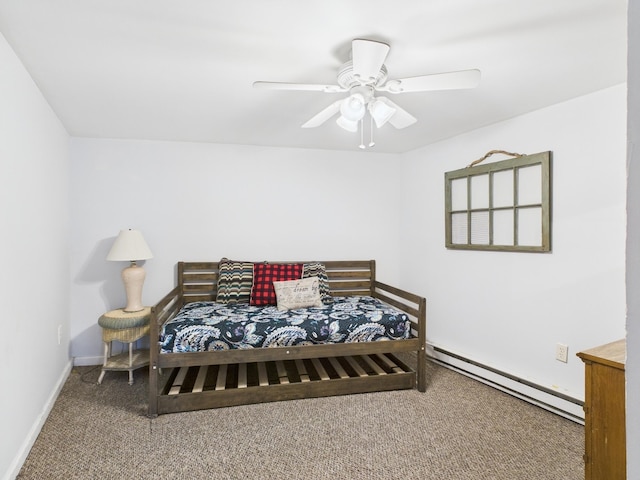 bedroom featuring carpet floors, baseboards, a baseboard heating unit, and a ceiling fan