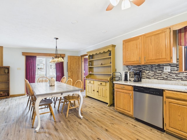 kitchen with tasteful backsplash, dishwasher, light wood-style flooring, hanging light fixtures, and open shelves