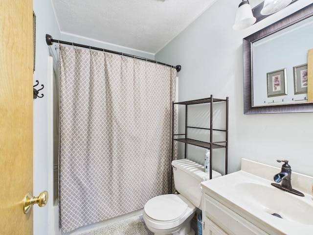 full bath with a textured ceiling, toilet, a shower with shower curtain, and vanity