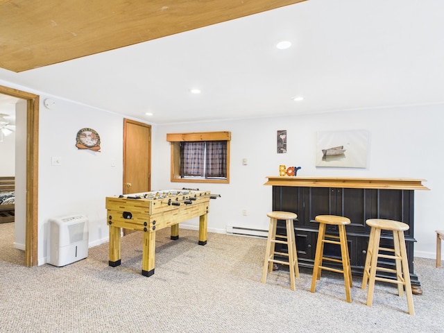 playroom featuring carpet floors, baseboards, and a dry bar