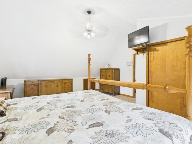 bedroom featuring lofted ceiling