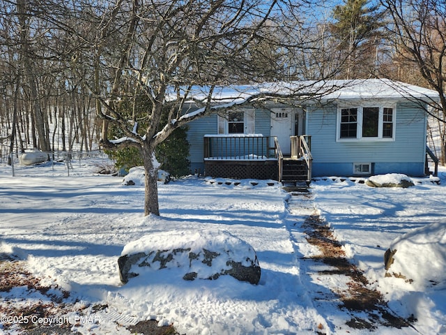 view of front of property with a deck