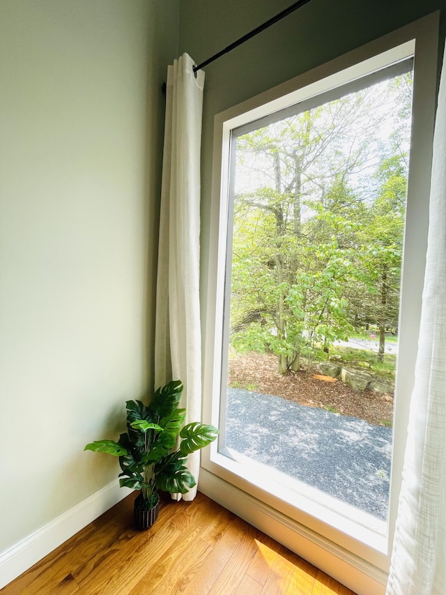 8540 Hillcrest Dr, Tobyhanna, PA 18466 - doorway to outside with wood finished floors and baseboards