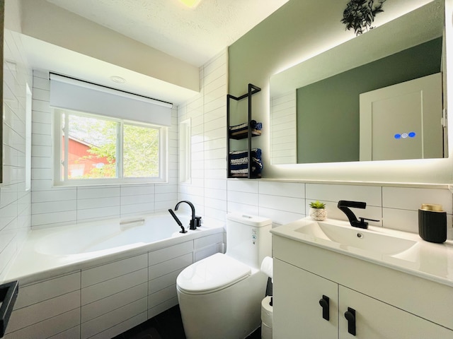 8540 Hillcrest Dr, Tobyhanna, PA 18466 - full bath with tile walls, tiled bath, vanity, decorative backsplash, and a textured ceiling