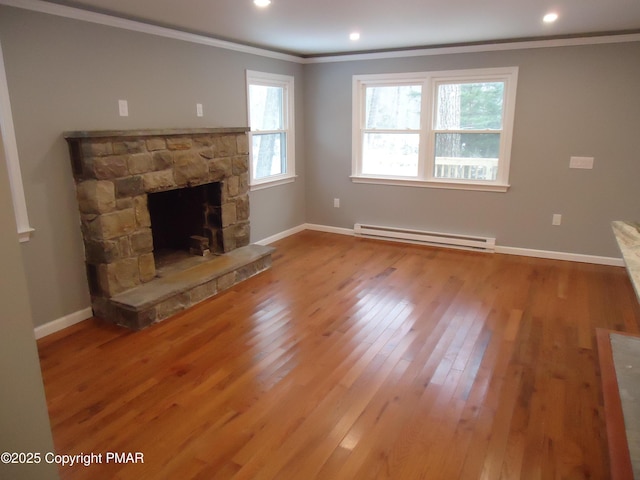 unfurnished living room featuring crown molding, a baseboard radiator, a stone fireplace, and hardwood / wood-style flooring