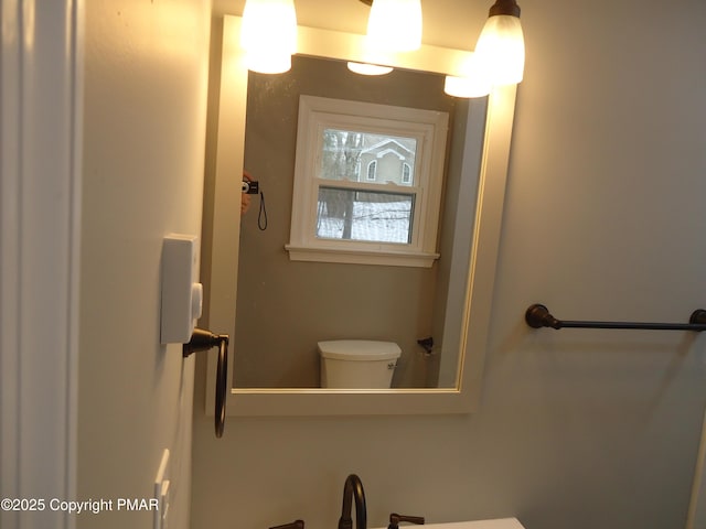 bathroom featuring sink and toilet