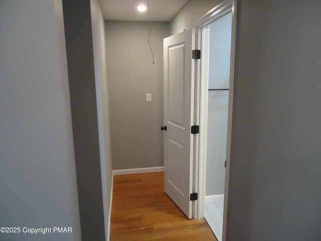 corridor featuring light hardwood / wood-style floors