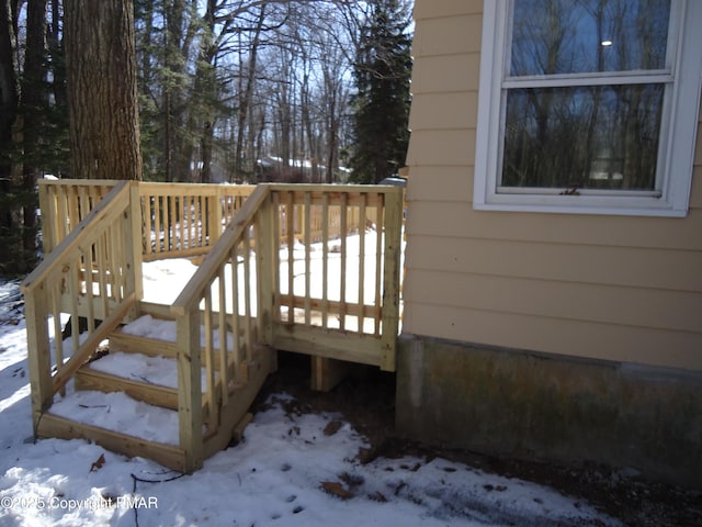 view of snow covered deck